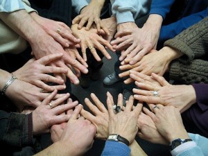 Members of Whidbey Giving Circle show their solidarity during a recent meeting.