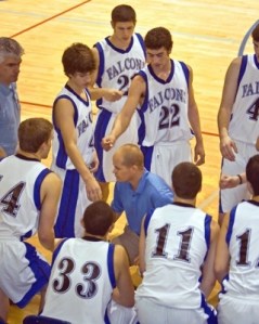 Falcon coach Scott Collins holds a final huddle during the fourth quarter against Archbishop Murphy on Feb. 17. South Whidbey had its best year since 1992 with 13 wins.