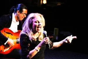 Langley jazz artist Nancy Nolan belts out “All of Me” accompanied by Troy Chapman of Pearl Django on the guitar. Nolan was a finalist in the  Kobe Jazz Vocal Queen Contest at Dimitriou’s Jazz Alley in Seattle in March. She didn’t win