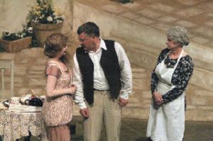 The Wiltons (Deana Duncan and Bob Atkinson) rekindle their love in Italy as the wise-cracking maid Constanza (Judith  Dankanics) looks on.