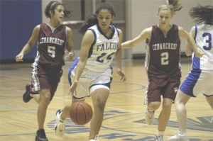 Falcon Samantha Pope sidesteps a Red Wolf defender during Fridays 65-51 loss to Cedarcrest Friday in Erikson Gym.