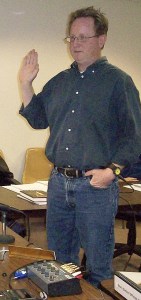 Russell Sparkman takes the oath of office after being appointed to the Langley City Council on Wednesday.