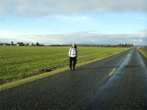 Kurt Hoelting pauses during a recent walking tour of the Skagit Valley. His goal is to explore his home region during his car-less year.