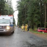 Kyle Jensen / The Record Responders clean up the wreckage Friday morning.