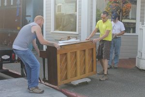 Good Cheer Food Bank truck drivers Clay Kiichli and Nick Metcalf