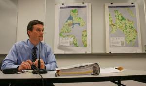 Island County Planning Director David Wechner listens to public comment during a hearing about possible marijuana production in the county.