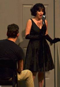 Deana Duncan sings to Tristan A.B. Steel during a scene in “City of Angels.” The show opens on Friday