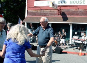 Ron Roessler and Helene Chandler (left) groove during the Street Dance on Saturday. Langley will soon be full of music and bustling with audiences during the annual Northwest DjangoFest. The festival begins today and runs through Sept. 23.