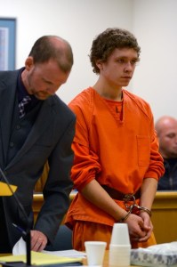 Langley attorney David Carman stands with Codie Burley in Island County Superior Court Monday. Burley was allegedly involved in a burglary in Greenbank that left a man paralyzed.