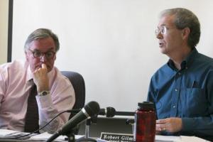 Mayor Paul Samuelson listens at Tuesday’s work session as Councilman Robert Gilman discusses the ordinance that led to the controversy on the mayor’s pay.