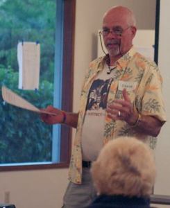 Langley City Councilman Bruce Allen welcomes people to the second Langley Economic Forum on Tuesday.