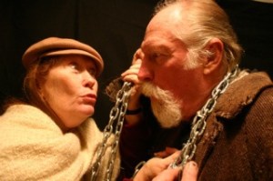 Annie Horton and Dwight Zehm join the fray in the farcical holiday production “Inspecting Carol