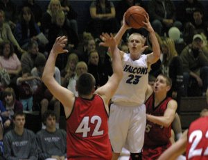 Riley Newman shoots over King’s defender Mason Friedline as Kyle Sawtell attempts to block the shot in action against King’s.