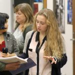 Evan Thompson / The Record                                South Whidbey High School senior Kari Hustad in the school band room as she and others prepare for &ldquo;Footloose,&rdquo; an upcoming musical by the drama program. Hustad was recently named a National Merit Scholarship semifinalist.