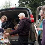 Kyle Jensen / The Record Volunteers from Trinity Lutheran Church and St Hubert Catholic Church fill a van with gifts for patients at Western State Hospital.