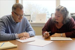 Evan Thompson / The Record                                Langley Mayor Tim Callison and Clerk and Treasurer Debbie Mahler examine the city&rsquo;s 2017 draft budget on Wednesday morning. City leaders will release the budget for public viewing on Nov. 19.