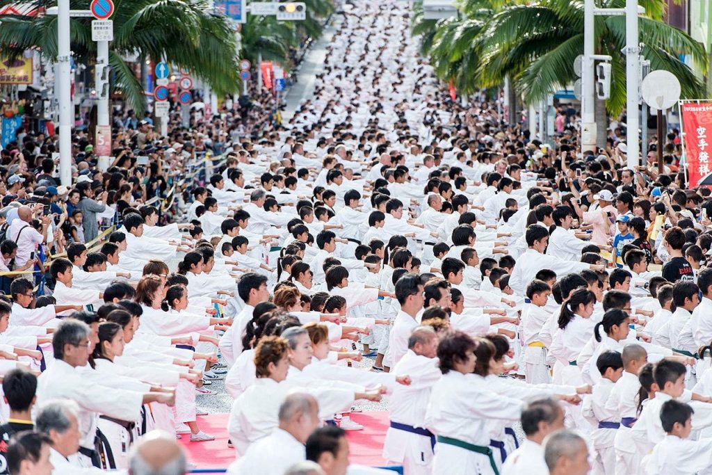 Contributed photo Berto and his students traveled to Okinawa this past year to participate in Fukyugata Ichi, a group training session. This year&rsquo;s event broke the Guiness record for largest group kata, or group style practice.