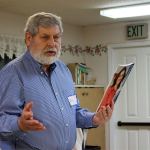 Kyle Jensen / The Record Langley resident Bill Marshall uses a visual aid while practicing a speech at the first open house for the local Toastmasters chapter, South Whidbey Sound Off.