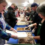 Record file                                A long line of volunteers packages dinners for those who otherwise wouldn&rsquo;t eat Thanksgiving.
