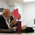 Kyle Jensen / The Record Stig Branfords, a member of the local Toastmasters chapter South Whidbey Sound Off, holds up a red card to mark the end of a speech time limit.