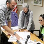 Evan Thompson / The Record                                Damon Arndt shows schematics of his proposed 7,000-square-foot wellness centre to Rene Neff (center) and Ursula Shoudy (right) of the Langley City Council.