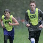 Matt Simms photo                                Langley Middle School eighth-grader Luke Gandarias (left) competes in cross country despite being blind since the age of seven. To his right is guide runner Cedar Rossel, a student at South Whidbey High School.