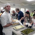 Record file                                Past volunteer James Canby serves up on Mobile Turkey Unit day in 2013.