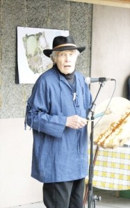 Using a drum to accentuate his words
