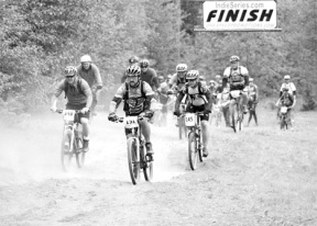 Mountain bikers from throughout the Northwest blast off at the start of the beginner's race Sunday morning in Langley