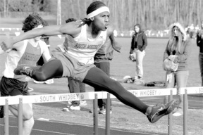 Jason Fitz runs to a win during the 110-meter hurdles March 16.