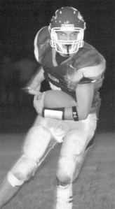 Falcon quarterback Kyle Hoch prepares to throw a pass to Ian Ward during Friday's 20-0 loss to Granite Falls. "I felt good