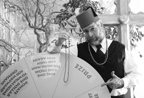 Anyone hoping to draw a bead on a winning spin at WICA's Mardis Gras night might want to talk to theater volunteer Chris Spencer. Though he won't be wearing the fez or the vest during the event