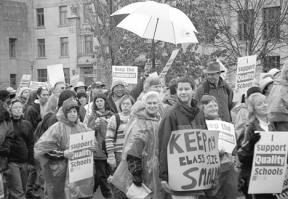 An umbrella held high by Langley’s Will Collins was a beacon for South Whidbey teachers and supporters during the Day of Action rally Tuesday in Olympia. The oversized purple
