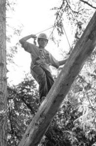 Beau Frye balances on a log at the Island County Ropes/Challenge Course last fall