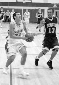 Senior Duncan Adams drops in two after a fast break down court as the Falcons fly past the Wolves in their home opener Saturday.