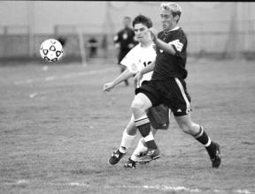 Defender Tore Jones muscles in and shuts down a Sultan drive early in the first half of Monday's 2-1 loss.