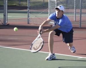 Falcon Jon Adams works on perfecting his volley skills Thursday as his team gets ready for the Mount Vernon Bulldogs.