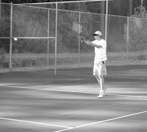 Alex Hoelting works over a Burlington-Edison player with long lobs Thursday.