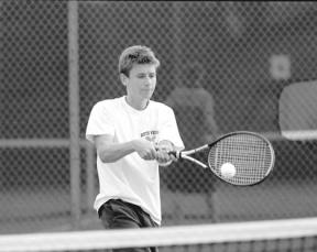 Falcon senior Kai Fleming-Snow returns a second-set winner as he comes back against Coupeville’s Trevor Mueller Wednesday.