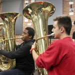Kyle Jensen / The Record                                High schoolers Quivande White (left), Jordan George (center) and Kenzo Sturm (right) rehearse for Peter and the Wolf. The trio are part of the talent development program, which offers young musicians a chance to play in the orchestra.
