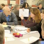Evan Thompson / The Record                                Lori O&rsquo;Brien, a parent of two in the South Whidbey School District, discusses challenges associated with the potential closure of Langley Middle School at a community meeting on Wednesday night at South Whidbey High School.