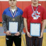 Jim Thompson photo                                South Whidbey wrestlers Hunter Newman (left) and Logan Madsen (right) won the 145 and 195-pound brackets at the Return of the Seahawk tournament on Dec. 3.
