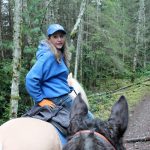 Kyle Jensen / The Record                                Whidbey Wranglers leader Erin Hanson leads a ride through Putney Woods. Hanson is the daughter of Diana and Gary Putney, the trail&rsquo;s namesake.