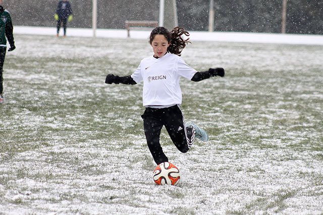 Evan Thompson / The Record                                South Whidbey Reign&rsquo;s Nicole Murnane prepares to pass the ball to a teammate on Saturday at South Whidbey High School.