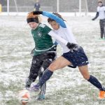 Evan Thompson / The Record                                South Whidbey Reign&rsquo;s Simone White battles for possession of the ball against an NSC Impact player on Saturday at South Whidbey High School.