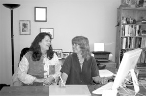 Cerra and Nyburg review a project. Their combined backgrounds bring the best of both worlds