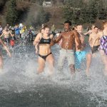 Polar bears dip into new year at Double Bluff Beach Park