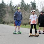 Evan Thompson / The Record                                Joshua Marks, 13, Isaiah McClure, 11, and Jacob Marks, 11 ride hoverboards down Edgecliff Drive. The area, including Decker and Furman Avenues, could see improvement in its infrastructure in the next half-decade.