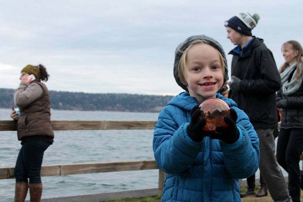Kyle Jensen / The Record                                Freeland resident Dalan Abernathy, 6, proudly shows off his token from this year&rsquo;s Sea Float Scramble. Abernathy says this is his fourth year.