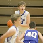 Evan Thompson / The Record &mdash; South Whidbey senior Kellen Boyd looks for an open Falcon player during a game against Bellevue Christian on Dec. 3. Boyd injured his ankle in a game on Jan. 17 and is questionable to play an important game for the Falcons this Friday night against Cedar Park Christian.